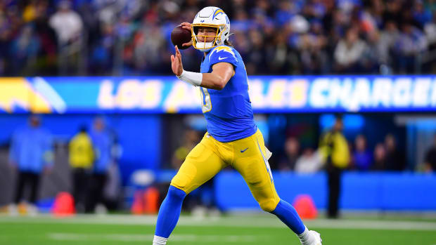 Dec 11, 2022; Inglewood, California, USA; Los Angeles Chargers quarterback Justin Herbert (10) throws against the Miami Dolphins during the first half at SoFi Stadium. Mandatory Credit: Gary A. Vasquez-USA TODAY Sports